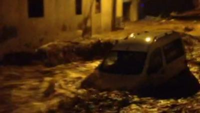 Van washed away in floods