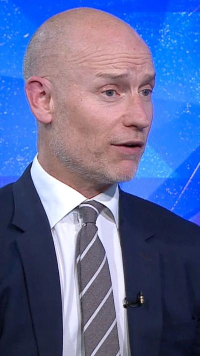 Stephen Kinnock wears a blue suit