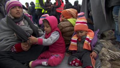 Family waits in the mud to enter Croatia