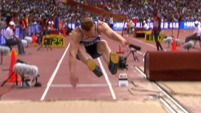 Greg Rutherford competes in the long jump heats