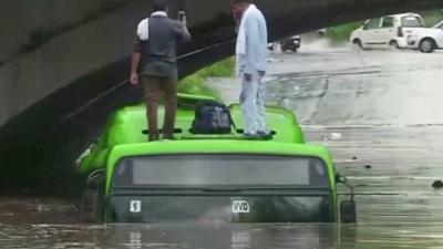 Monsoon rains caused flooding in several areas of India's capital Delhi on Sunday.