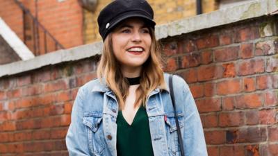 Hannah Elliman poses in second-hand clothing in image from blog