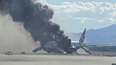 Smoke billowing from a plane