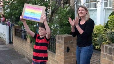 Dr Ali Sanders and her son at Clap for Carers