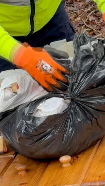 A black bag of fly-tipped rubbish