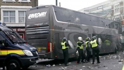 Riot police next to Man Utd team bus at Upton Park