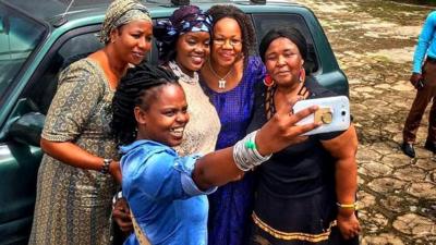 Katchie Nzama poses for a selfie on her travels