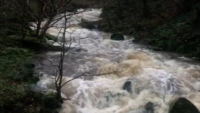 A swollen river in Snowdonia during Storm Gareth