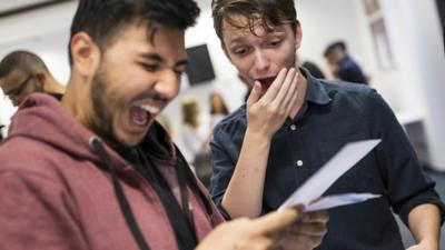 Boys opening their A level results