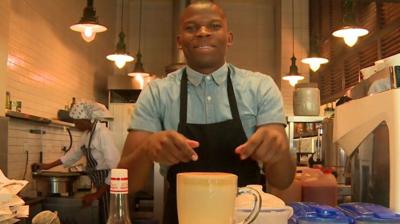 Barista serving coffee