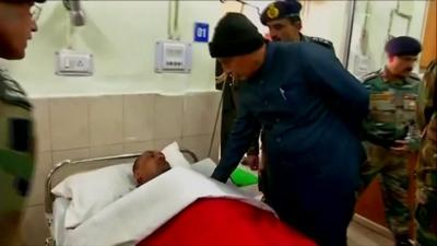 India Interior Minister Rajnath Singh meets officer lying in hospital bed