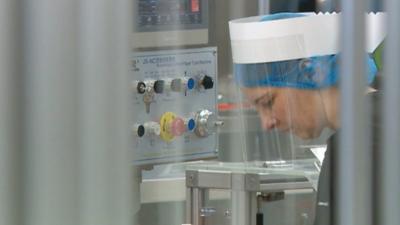 Factories across Wales show how they are adapting to work in the age of coronavirus.