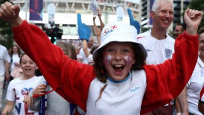 Girl celebrates after England win