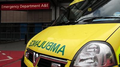 An ambulance at an A&E building