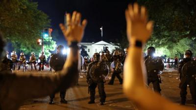 Police and protesters outside the White House