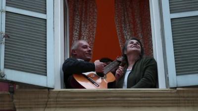 man-with-guitar-and-woman.