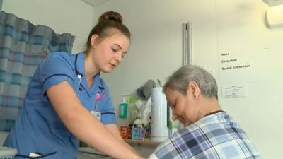 Brooke with a patient