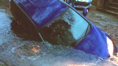 Car in sinkhole