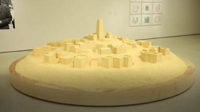 An artistic rendering of a North African town in couscous