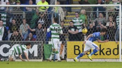 Graham Cummins (right) races away after scoring