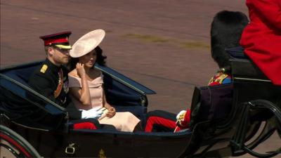 Crowds cheered when the Duke and Duchess of Sussex emerged as part of a carriage procession at Trooping the Colour.