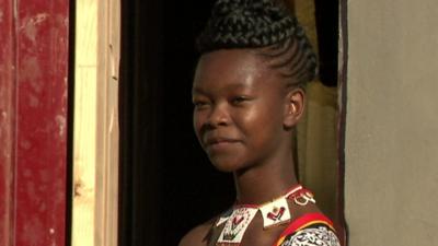 Sandizile Malindiza standing in a doorway