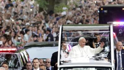 Pope Francis waves to crowds in Central Park in New York