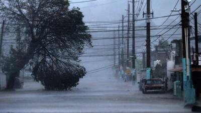 A street is flooded during the passing of Hurricane Irma in Fajardo, Puerto Rico