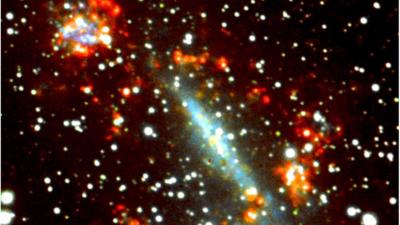 'Kathryn's wheel' collision lights up galaxy