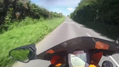 Speeding biker