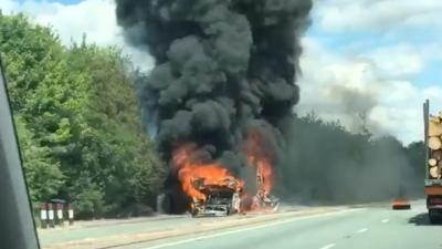 Bus on fire on A11 near Cambridge