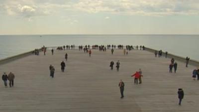 The first visitors to the rebuilt Hastings Pier