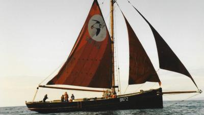 Archive picture of old ship with sails on the sea.