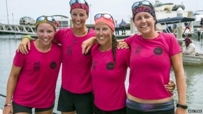 Members of the Coxless Crew pose for a picture in Cairns, Australia, after completing the last leg of their unaided, rowing journey across the Pacific Ocean