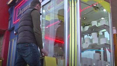 Grabber machine with toilet rolls