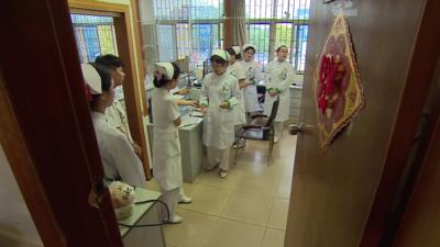 Staff at the Baiyun drug rehabilitation clinic in Guangzhou, China.