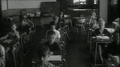 Children sitting in a classroom in 1954