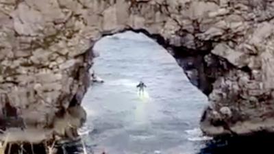 Jet suit under Durdle Door