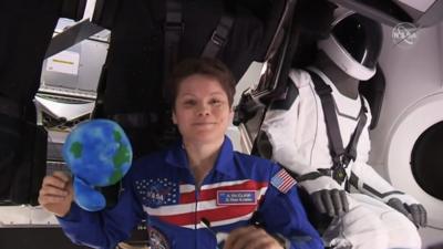 Anne McClain onboard the Space X Crew Dragon.