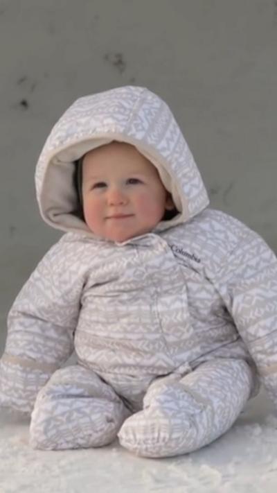 A baby in a small igloo