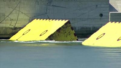 A barrier rises in Venice