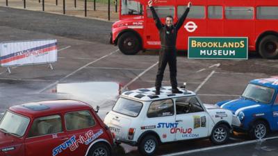 Alastair Moffat from Gloucester celebrates after he achieved the world's tightest parallel park in reverse, in Surrey, 12th November 2015