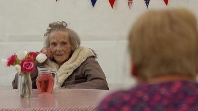 A care home is reuniting loved ones with socially distanced garden visits.