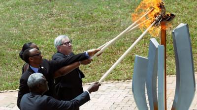 Rwanda president lights flame with others