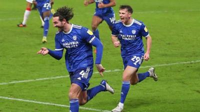 Sean Morrison celebrates scoring the winning goal