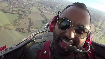 Marc Cieslak in a plane cockpit