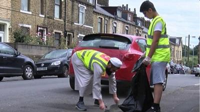 Two people cleaning in Bradford