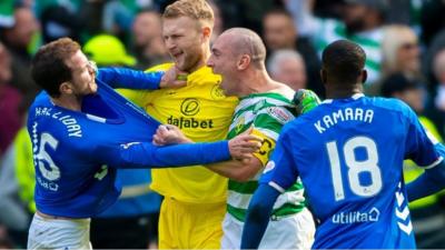 Celtic & Rangers players clash after final whistle