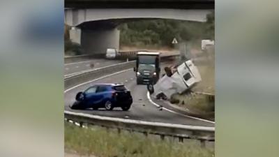 Aftermath of a crash between a van and a car