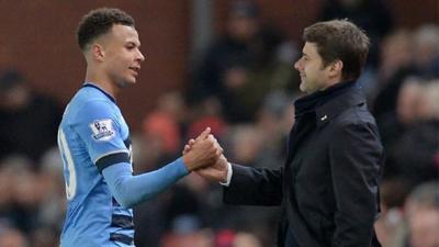 Dele Alli and Mauricio Pochettino